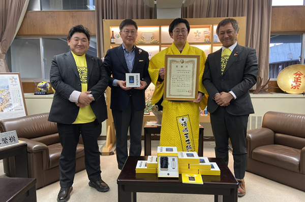 ポケトーク贈呈式（今治焼豚玉子飯世界普及委員会様）の写真 1